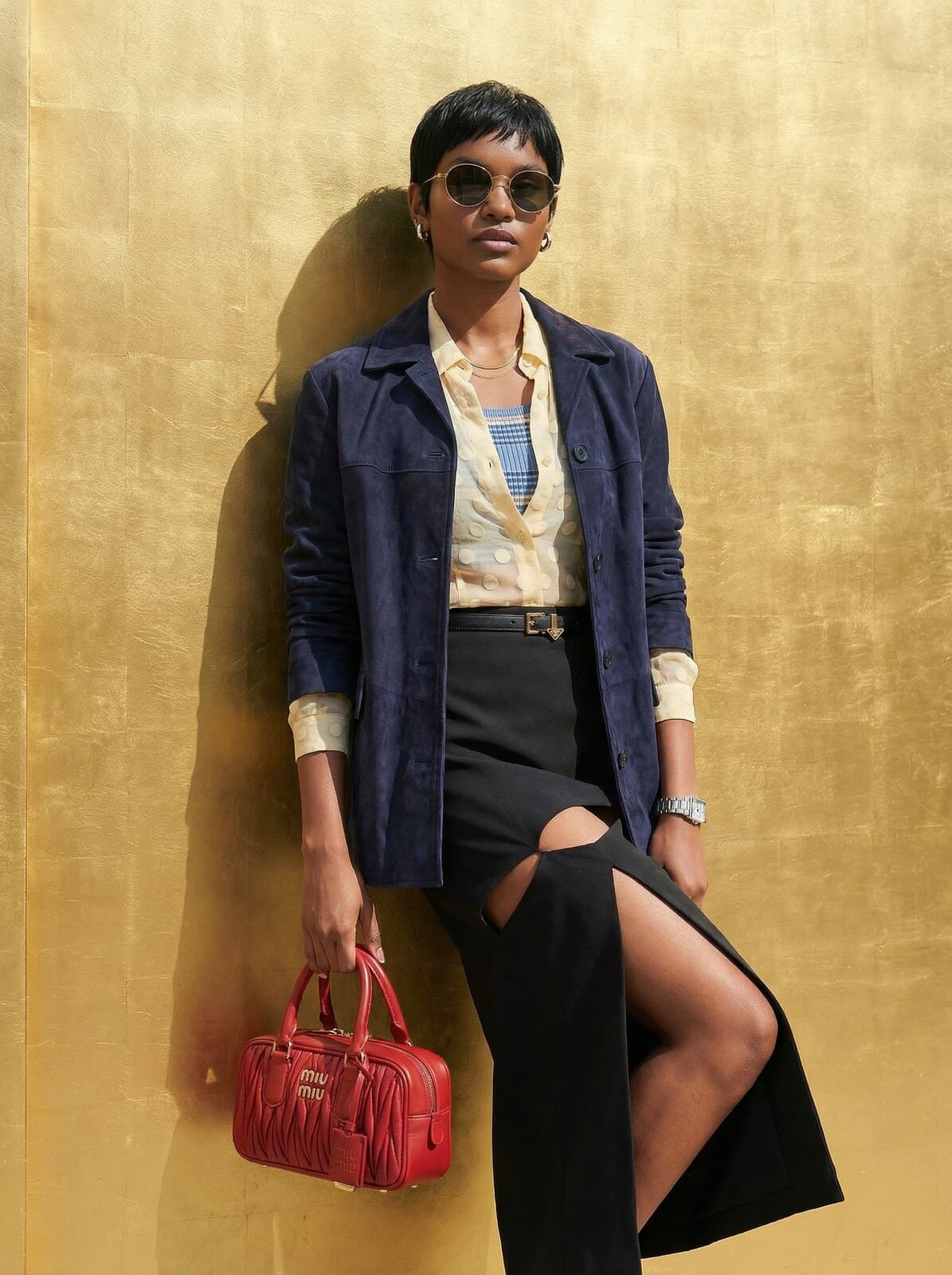 Miu Miu gold wall